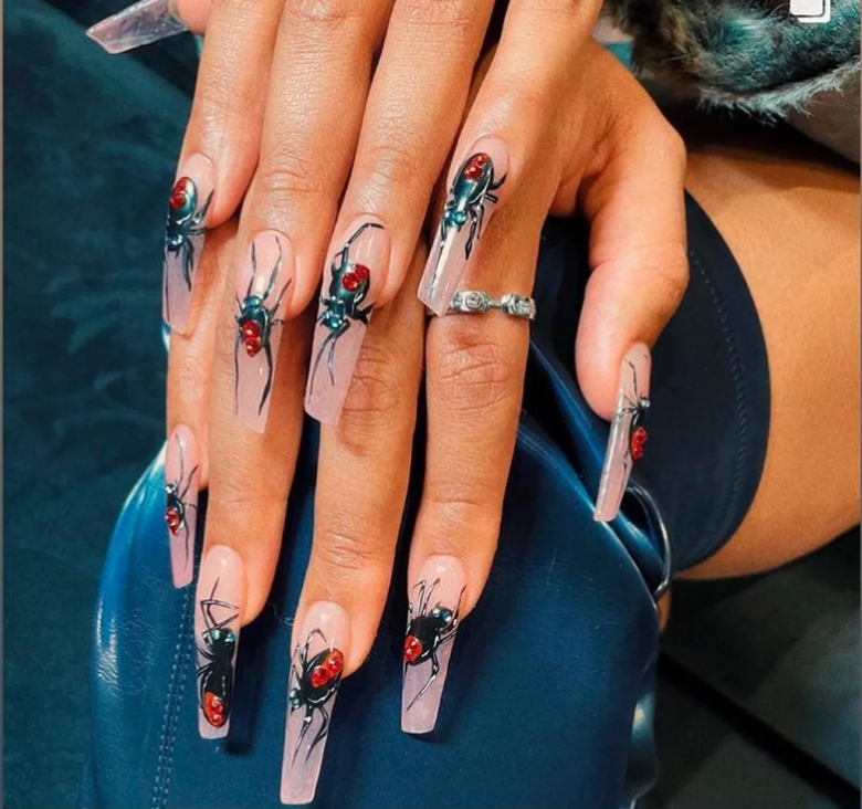 Megan the Stallion clearly doesn't have arachnophobia with this jaw dropping set from 2021