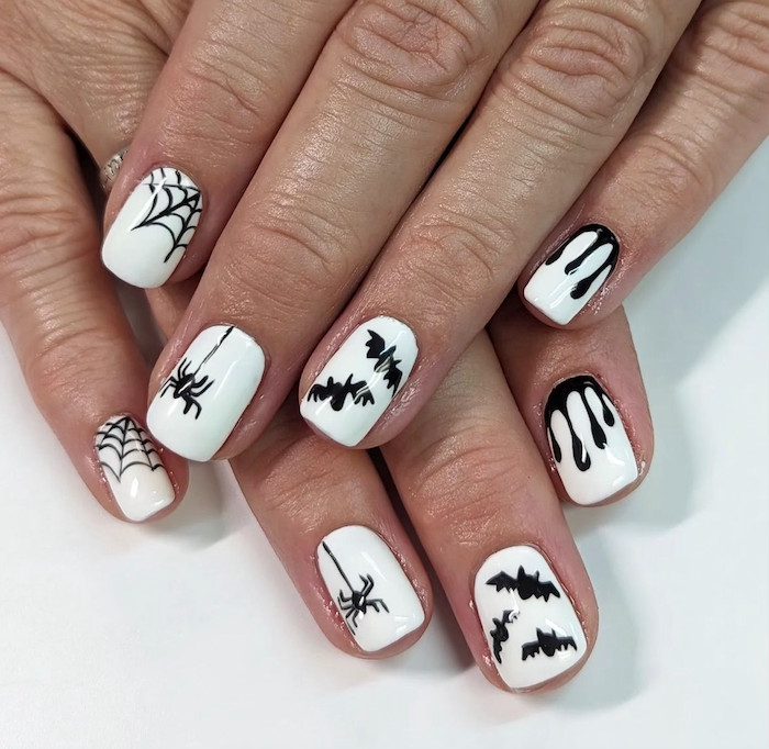A simple black and white theme can make a huge impact as shown here in nail art by @nailsbycarlyc on IG